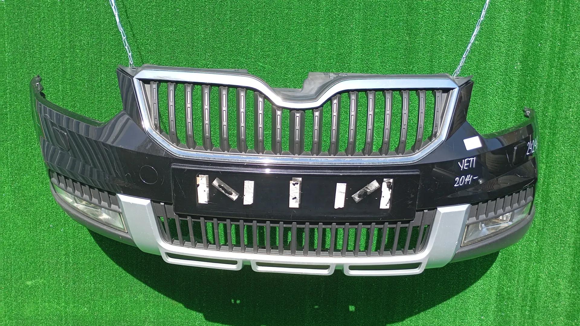 Бампер SKODA YETI 2014- передний под омыватели фар чёрный б/у