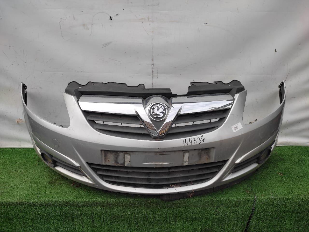 Бампер OPEL CORSA D 2011- передний серебро б/у