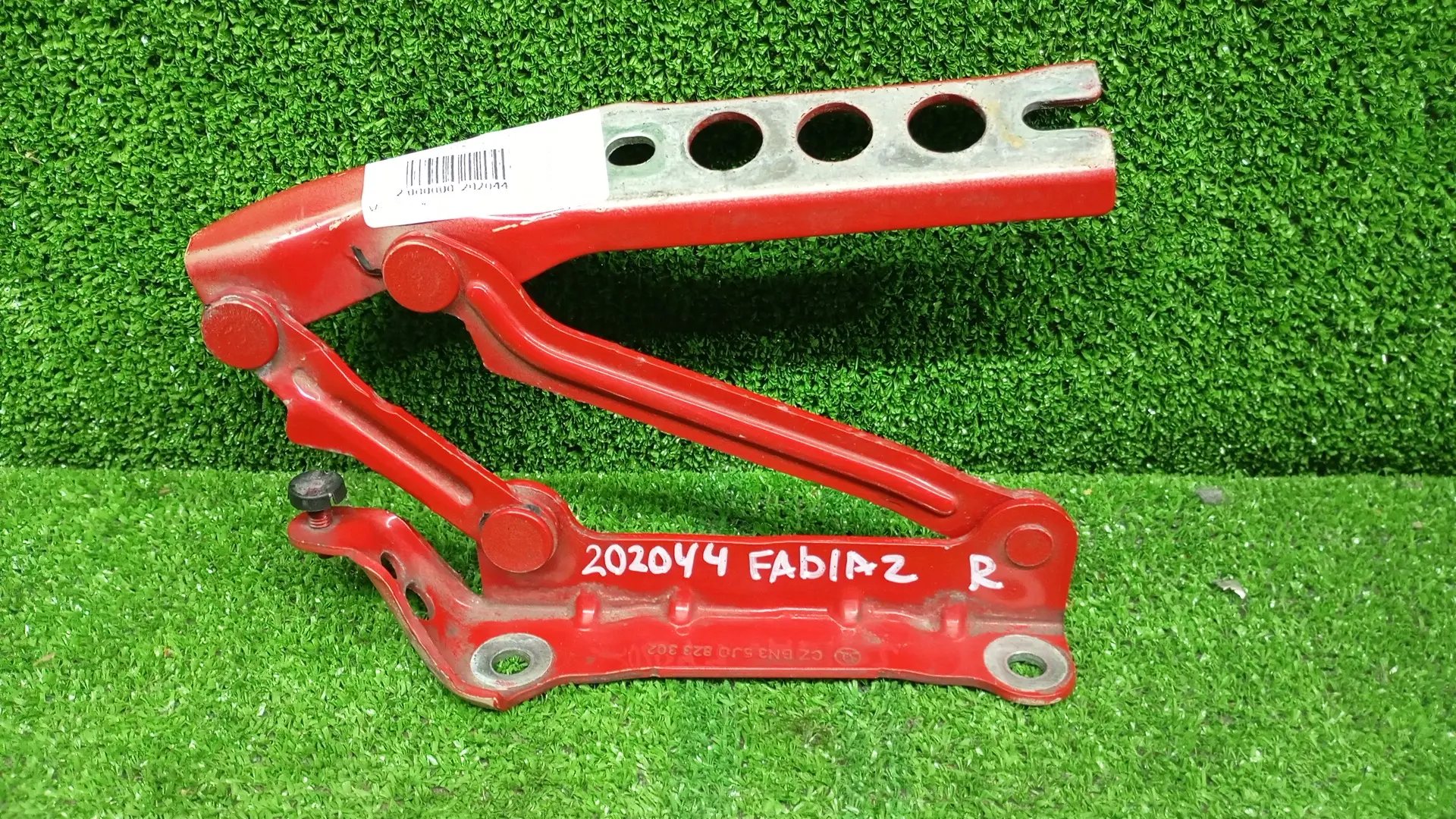 Петля капота SKODA FABIA 2, ROOMSTER 2007- правая красная б/у