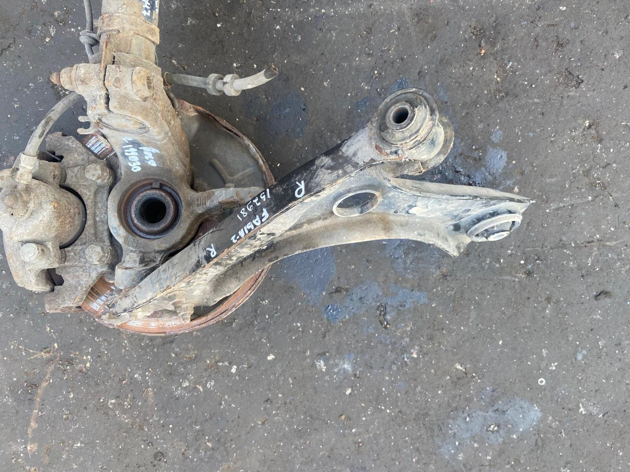 Кулак поворотный AUDI A1, SKODA RAPID, FABIA 2, VOLKSWAGEN POLO 1,6 2010- без рогов правый 256мм б/у