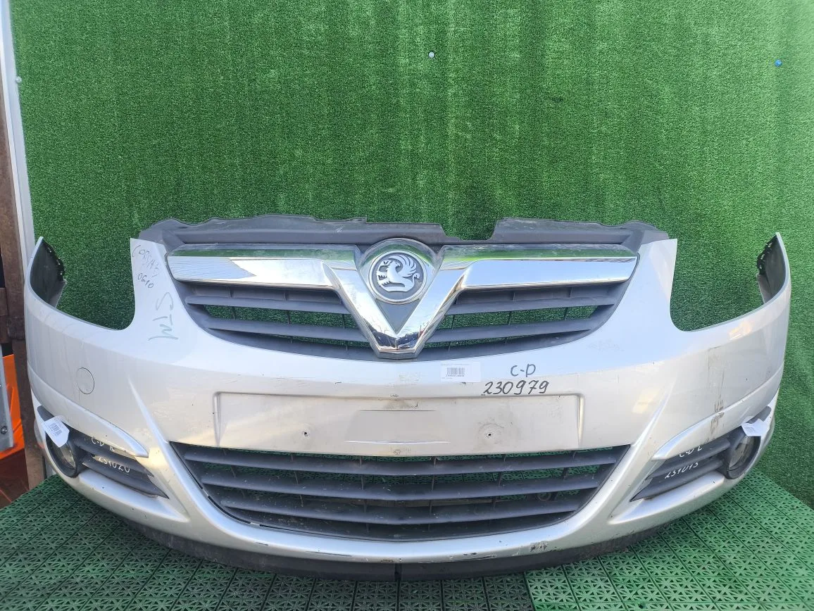 Бампер OPEL CORSA D 2006- передний серебро б/у