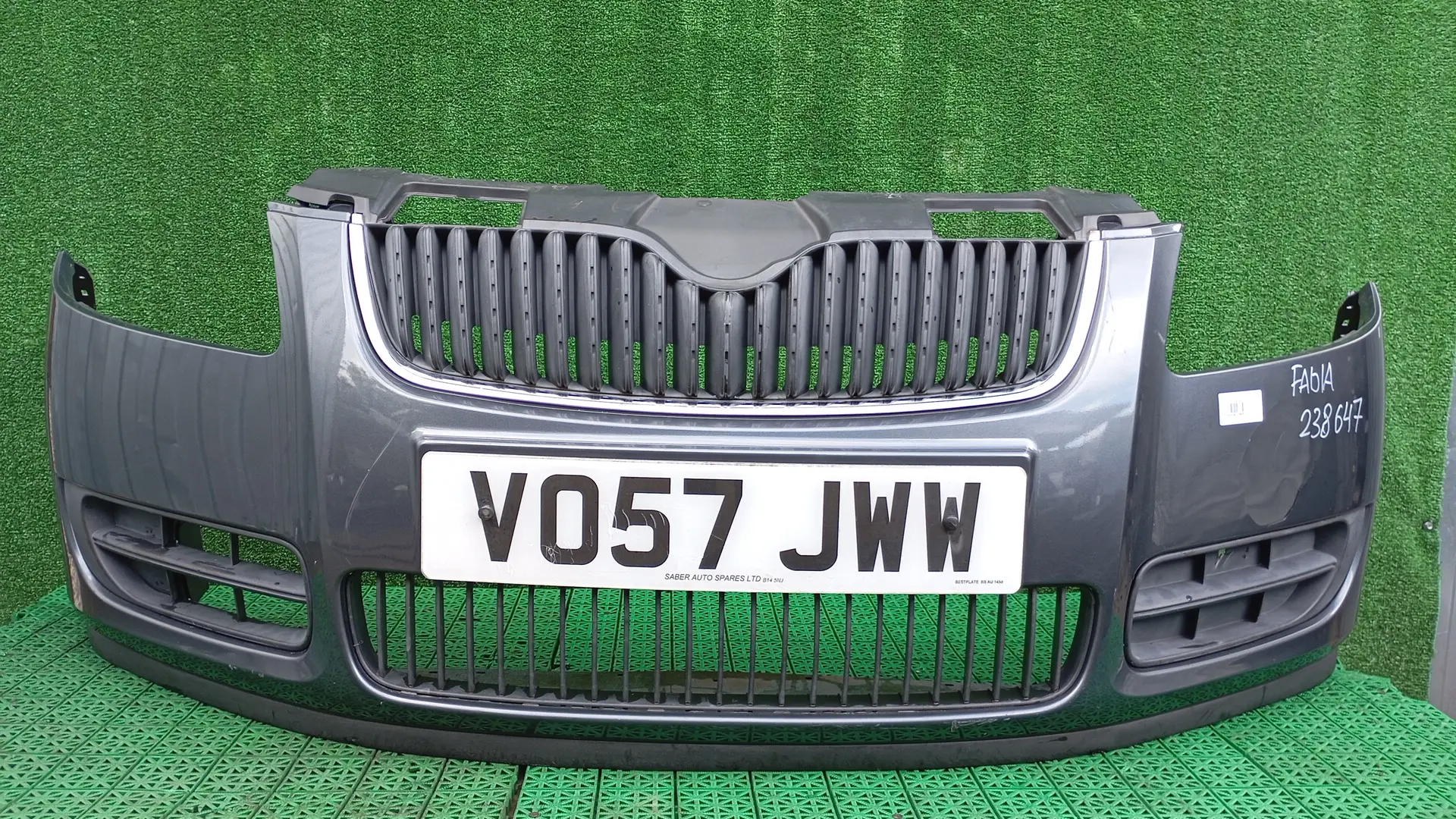 Бампер SKODA FABIA 2, ROOMSTER 2007- передний серый б/у